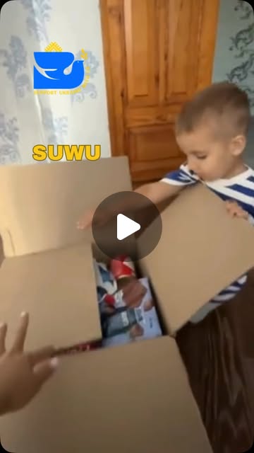 A child opening a Support Ukraine With Us aid box in a Reel preview